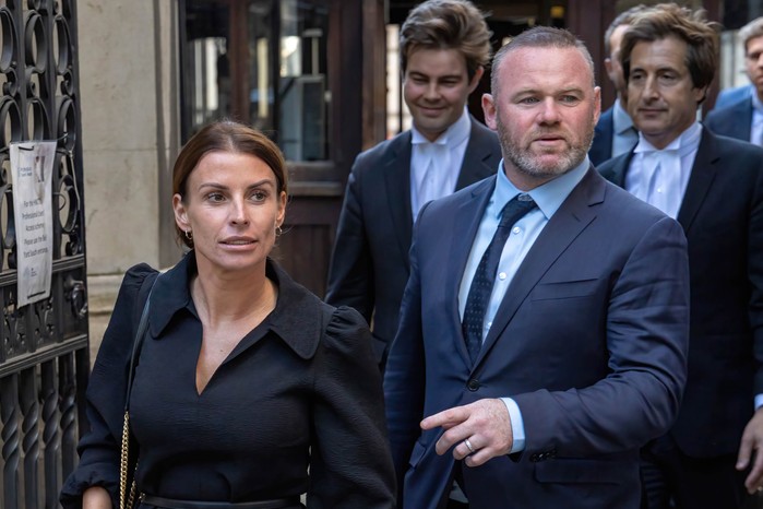 Coleen and Wayne Rooney leave court after giving evidence in